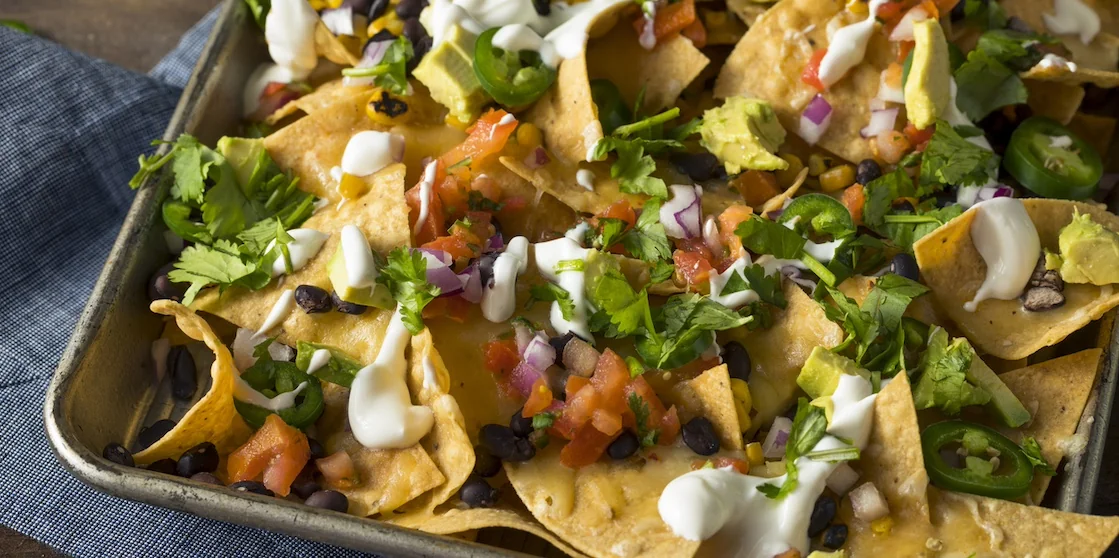 Homemade Loaded Sheet Pan Nachos with Cilantro Lime Tomato and Onion - great for game day