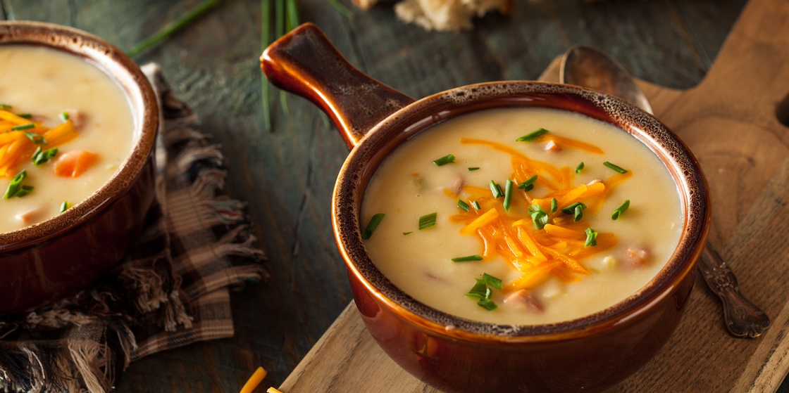 Homemade Beer Cheese Soup with Chives and Bread