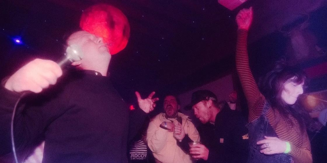 karaoke night - group singing and dancing at Ghost Light, taken by Alex Flegal