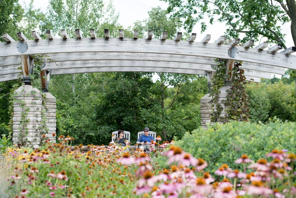 Couple in rocking chairs at Matthaei Botanical Gardens & Nichols Arboretum