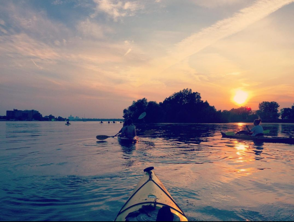 Kayak on Detroit River at sunset