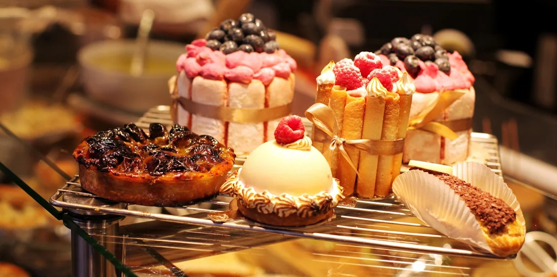 French pastries on display in a confectionery shop
