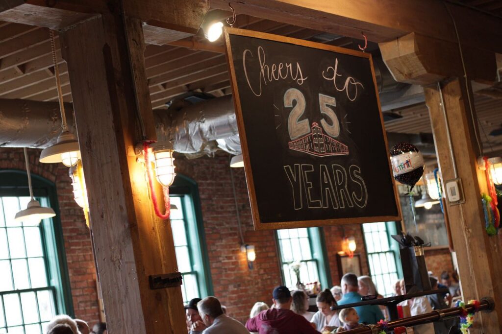 Rochester Mills Brewing Company sign for 25 years in business