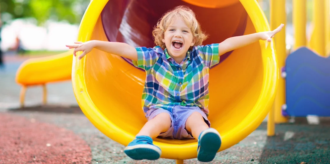 Child playing on outdoor playground