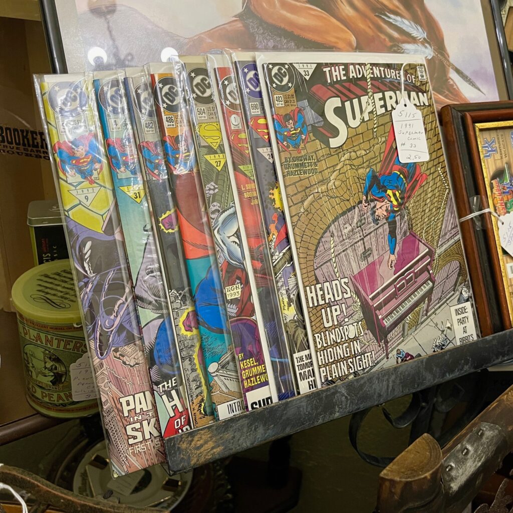 thrift comic books shelved at odd fellows antiques 