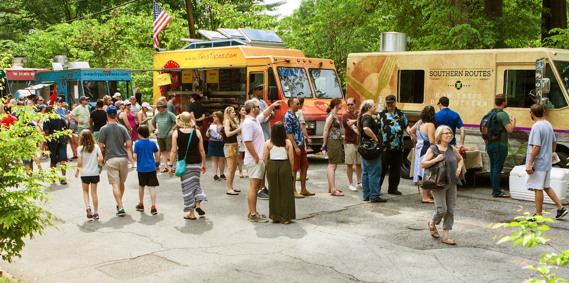 crowd surrounding a food truck