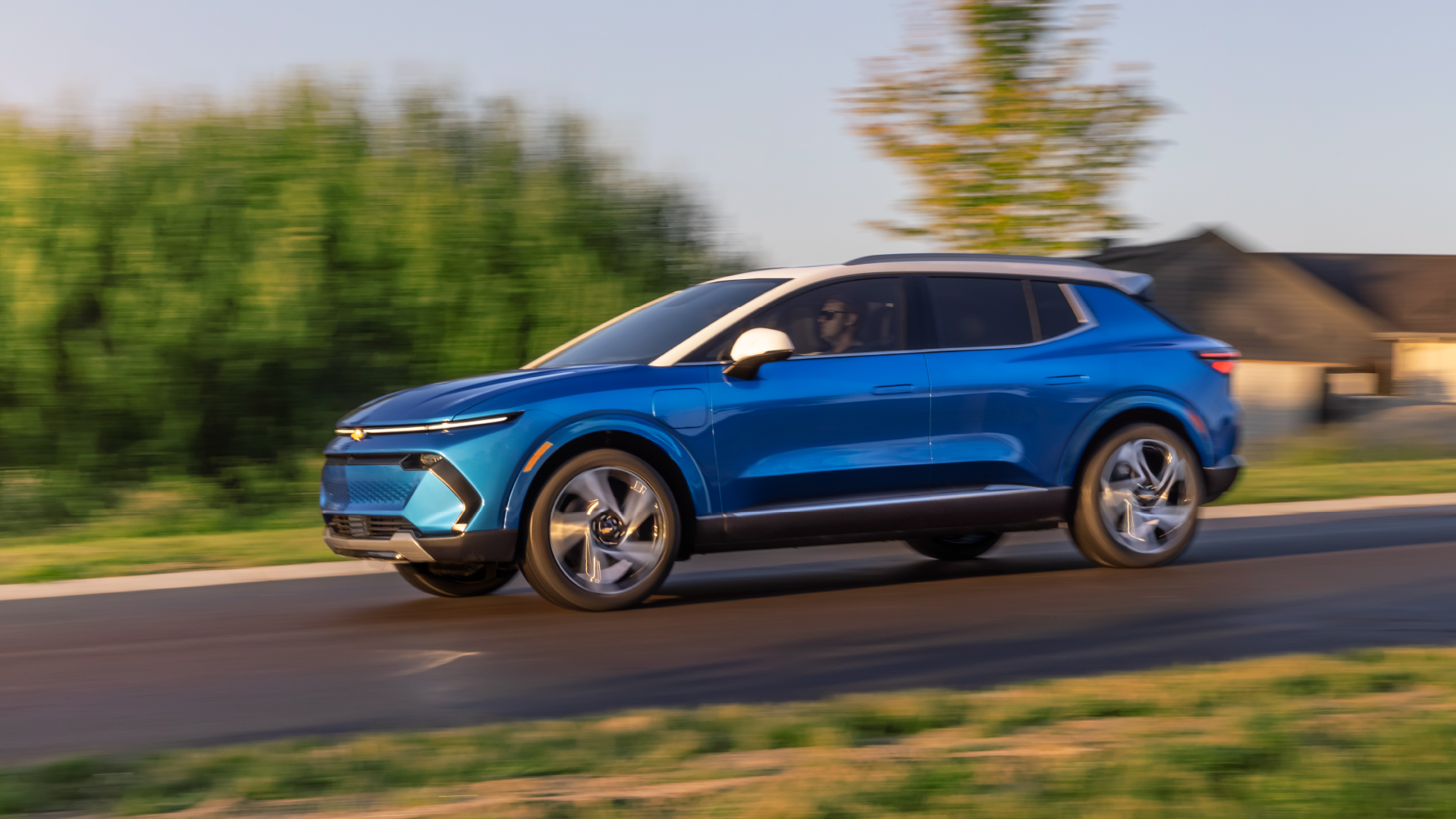 blue equinox ev on the road