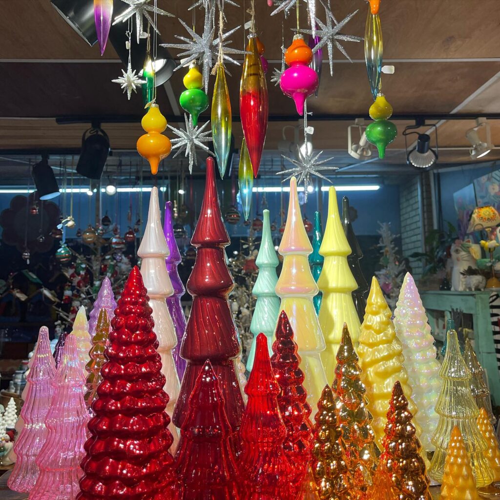 Poesy glass christmas tree display with hanging ornaments - local boutiques