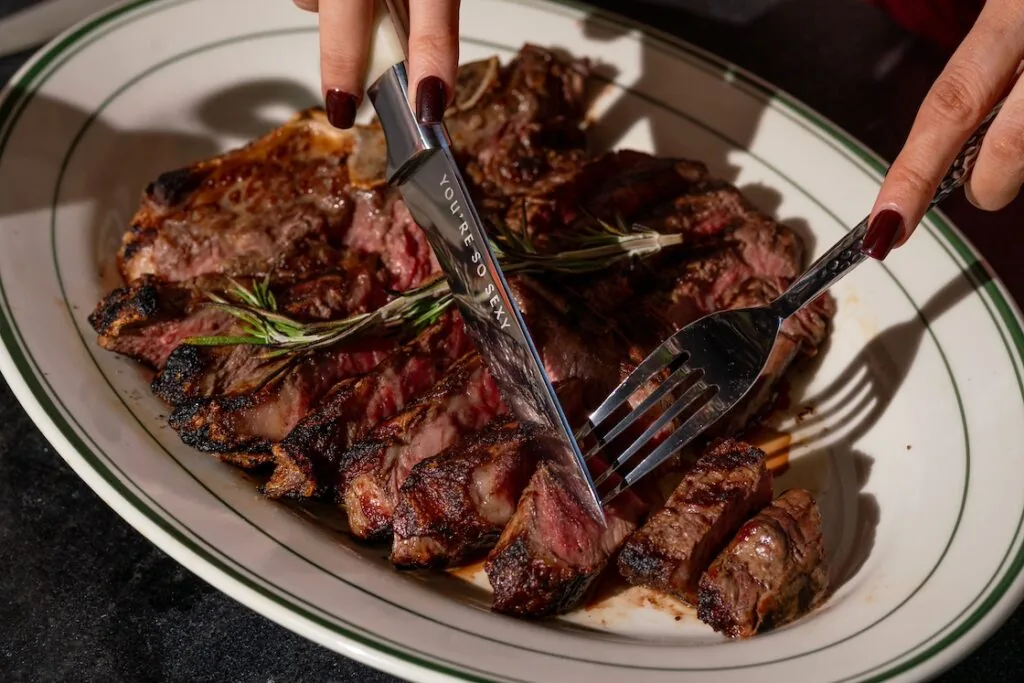 sexy steak steak being cut