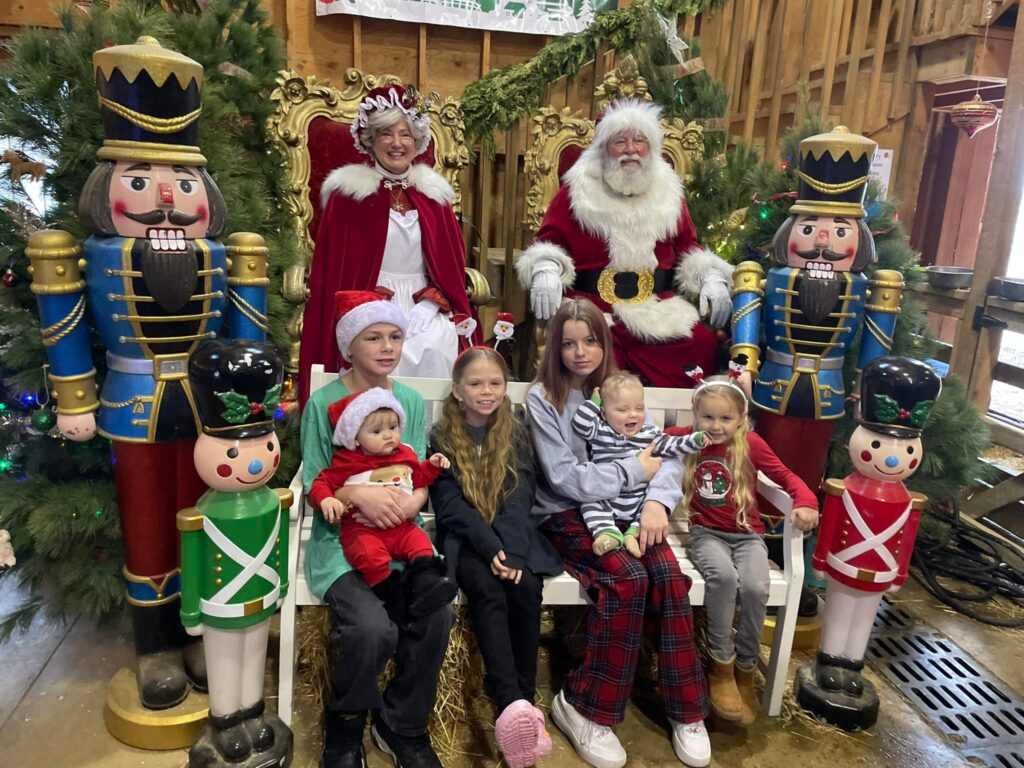 santa and mrs. claus visits at heritage park petting farm