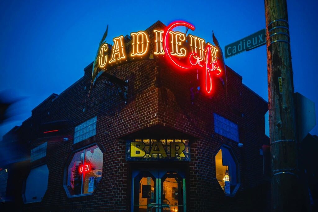 exterior of Cadieux Cafe with the Cadieux street sign