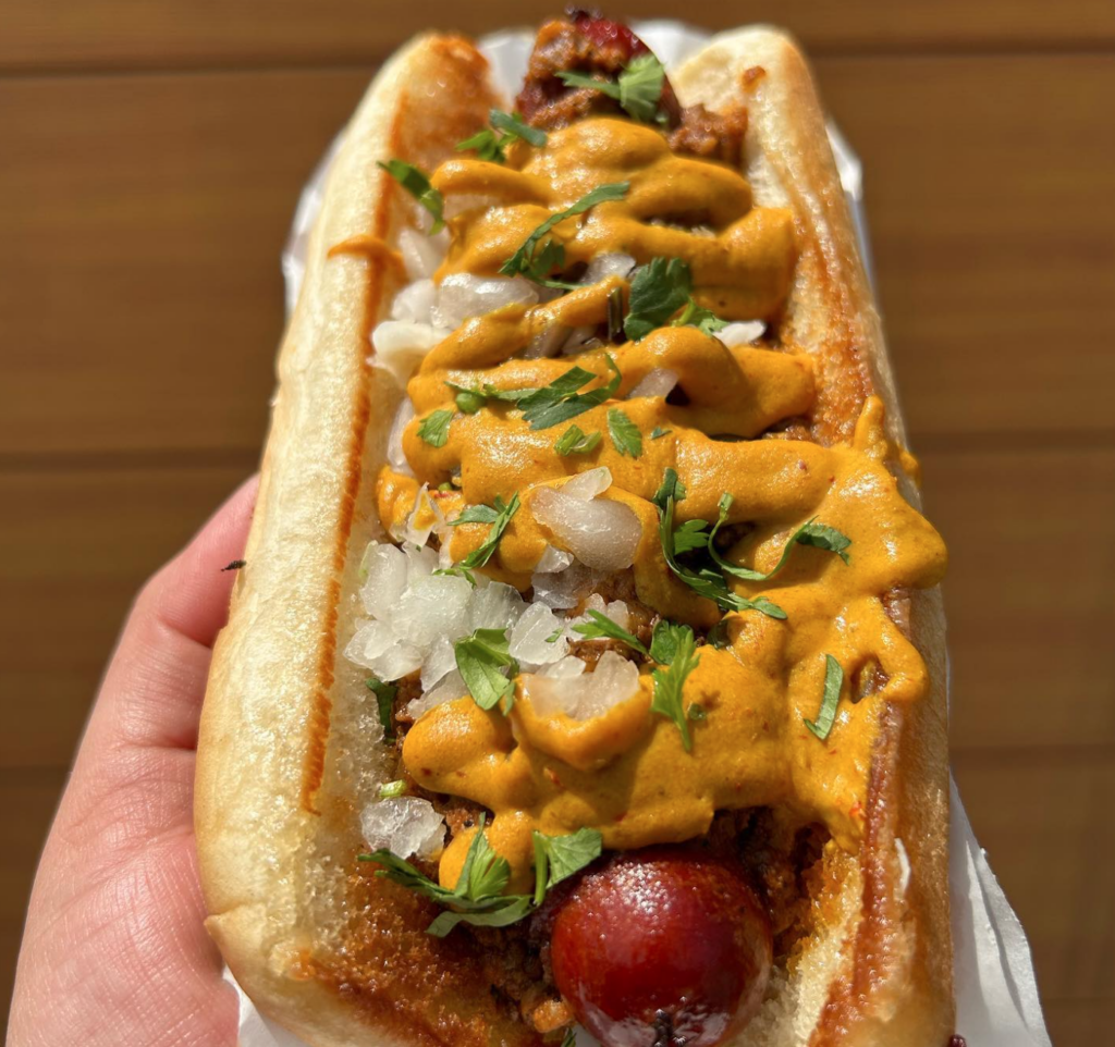 chino sonoran from imperial with mustard, onion, cilantro, and chili - chili dogs