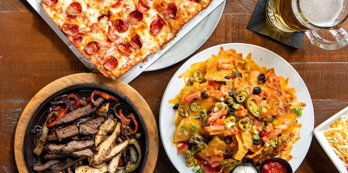 shores inn pizza, ultimate nachos, and fajitas