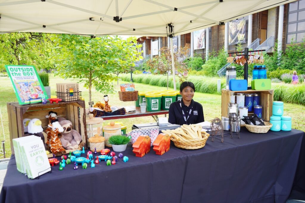 detroit zoo greenfest spring events display table with fertilizer, animals, and more