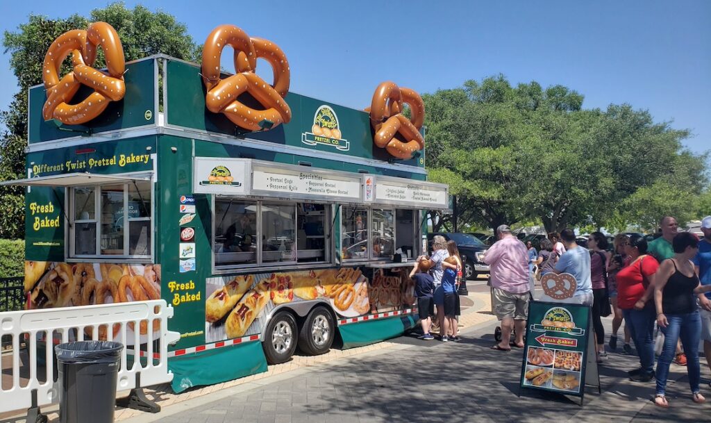 different twist pretzel mobile bakery with a line of people ordering soft pretzels