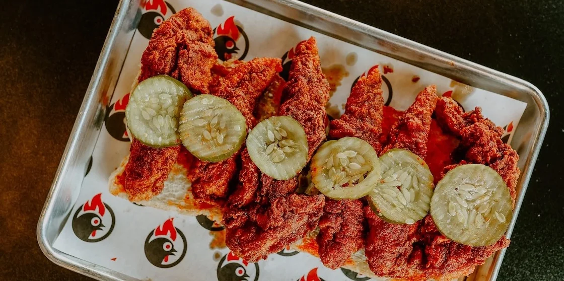 hot chicken tender tray with pickles from little lou's hot chicken