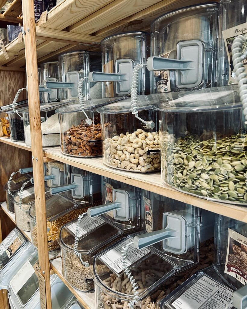 shelves of pantry items from walking lightly to refill - pasta, nuts, grains