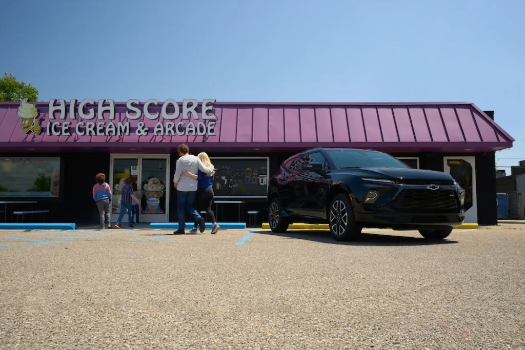 blazer outside high score ice cream and arcade with family going inside