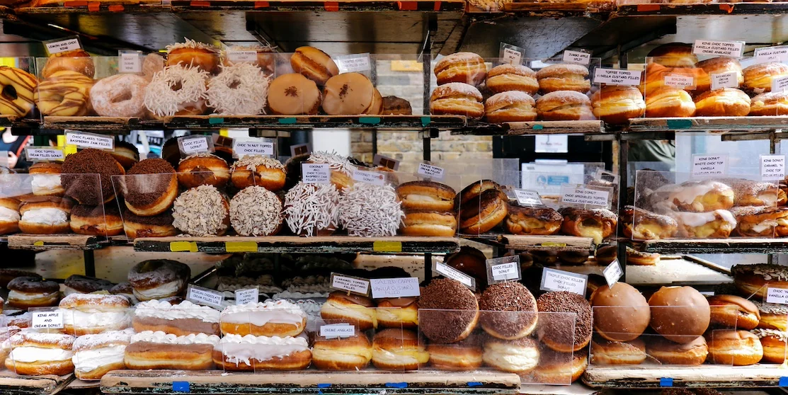 Variety of donuts on a market stall