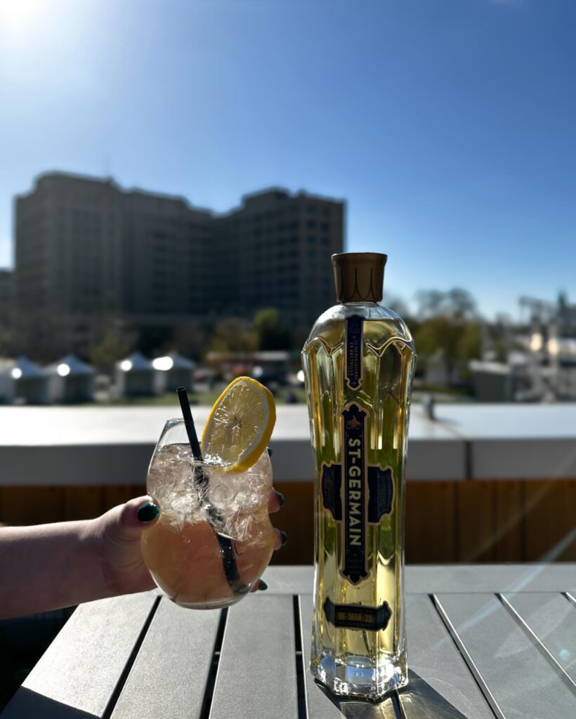 cocktail with st. germain on lumen's rooftop bar