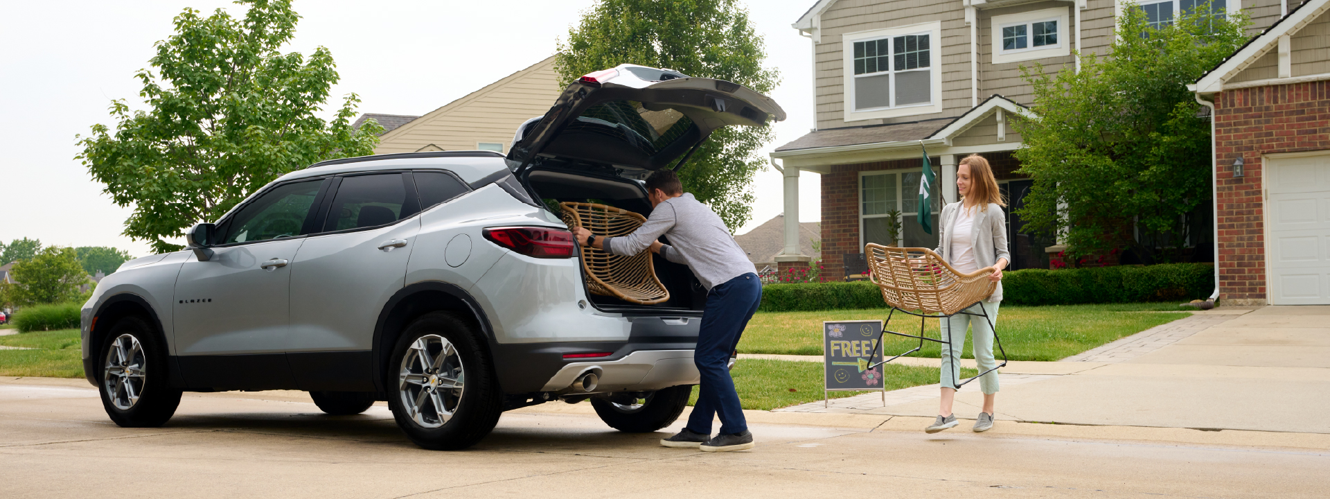 Silver Blazer picking up chairs