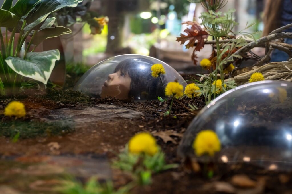 kid in garden bubble at the belle isle nature center - summer fun