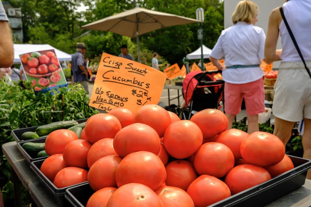 tray of tomatoes and cucumbers at birmingham farmers market