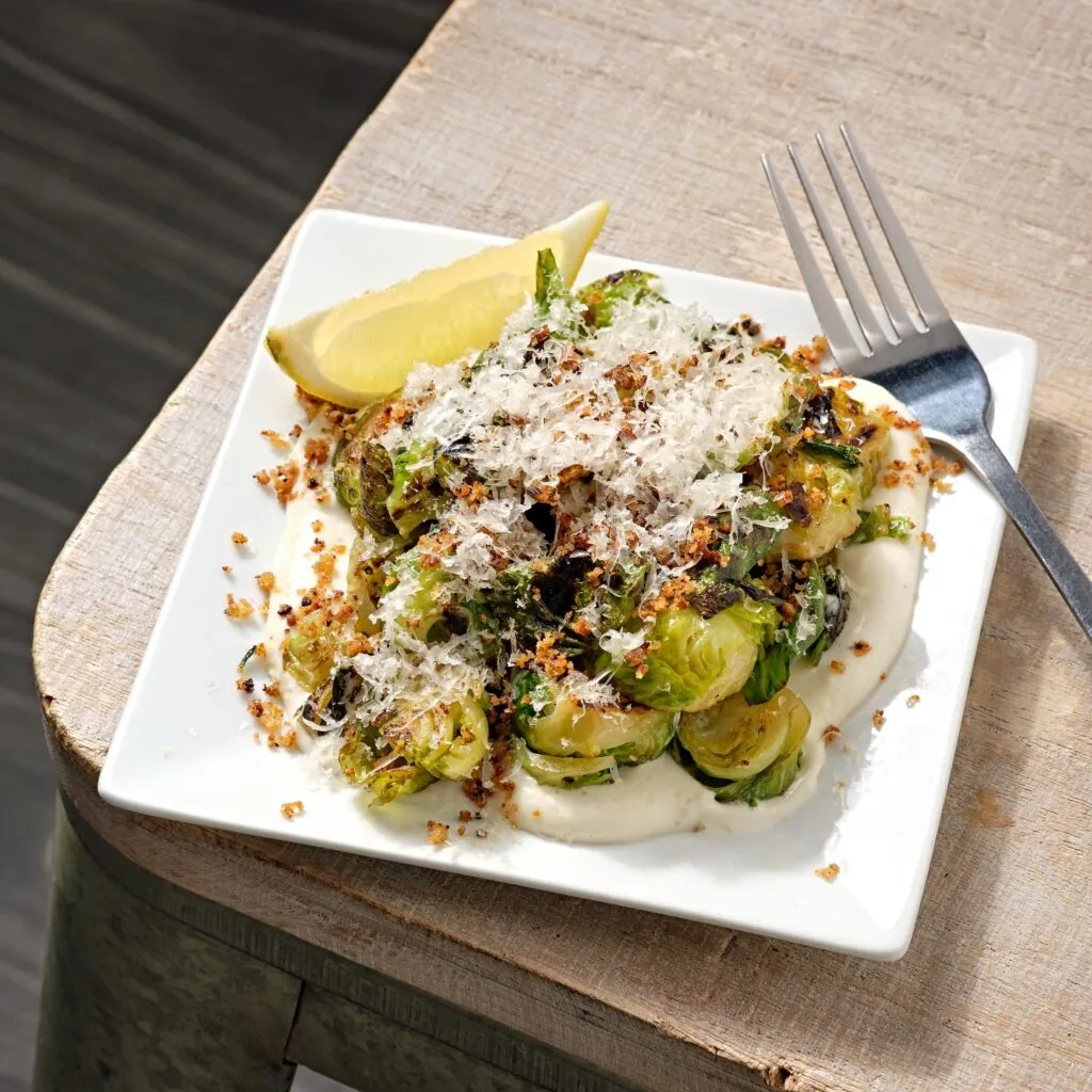 brussels sprouts from plant-based restaurant the kitchen by cooking with que