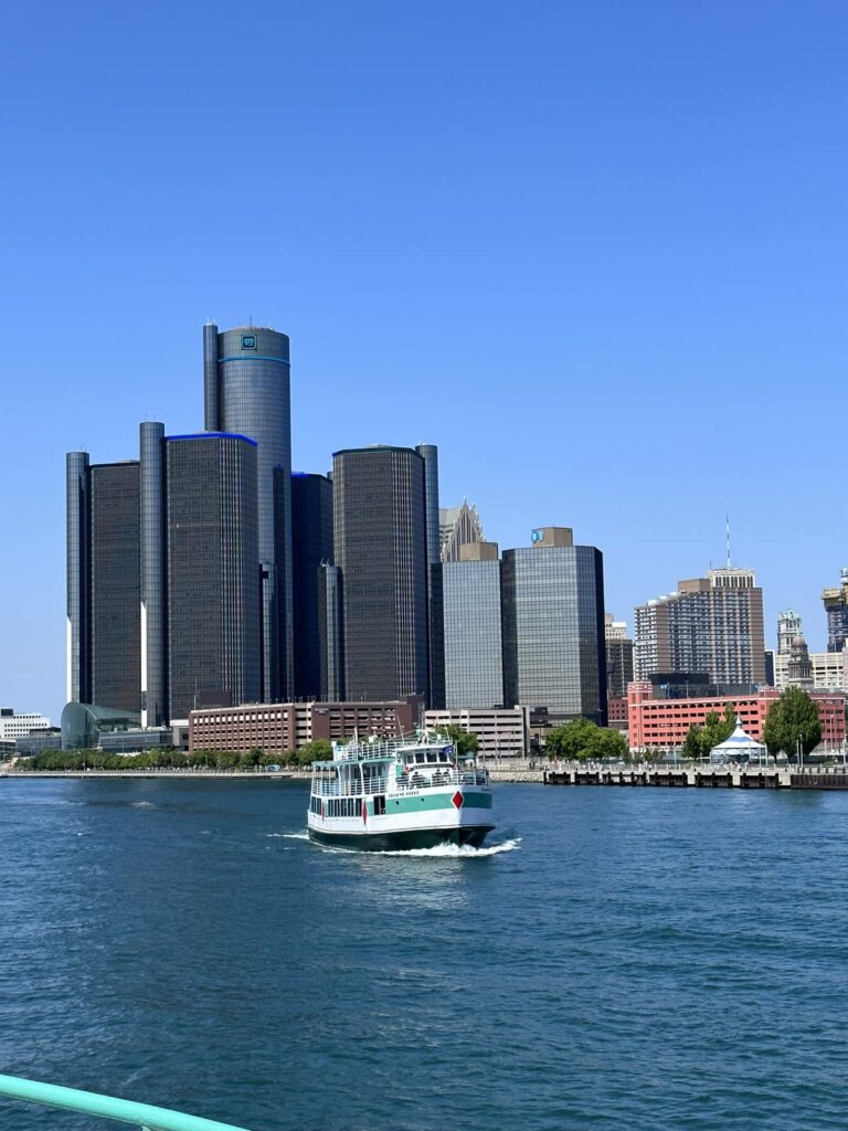 diamond jack's boat passing the ren cen on the detroit river