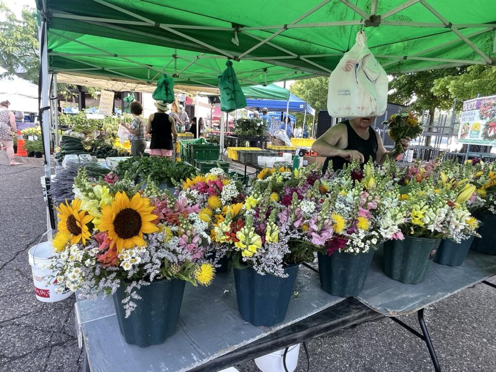 buckets of flowers at farmington farmer market