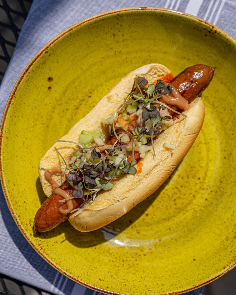 Coeur's happy hour hot dog, photographed by Mark Kurlyandchik/Booth One Creative