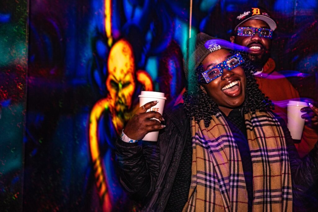 Couple walking through haunted 3d maze at Blake's Big Apple
