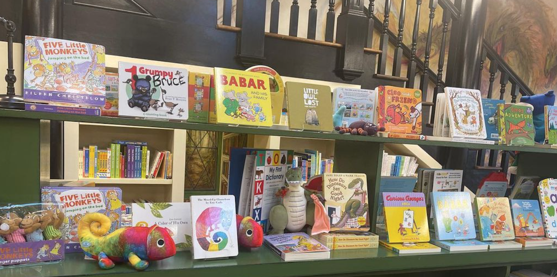 shelves of children's books at coreander's children's bookshoppe