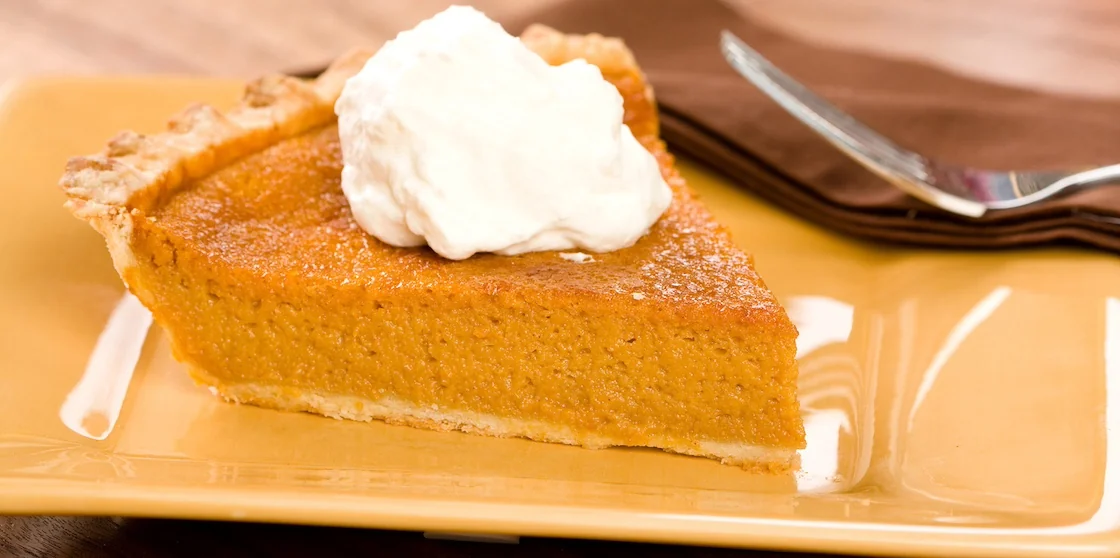 Sweet Potato Pie with a dollop of freshly whipped cream