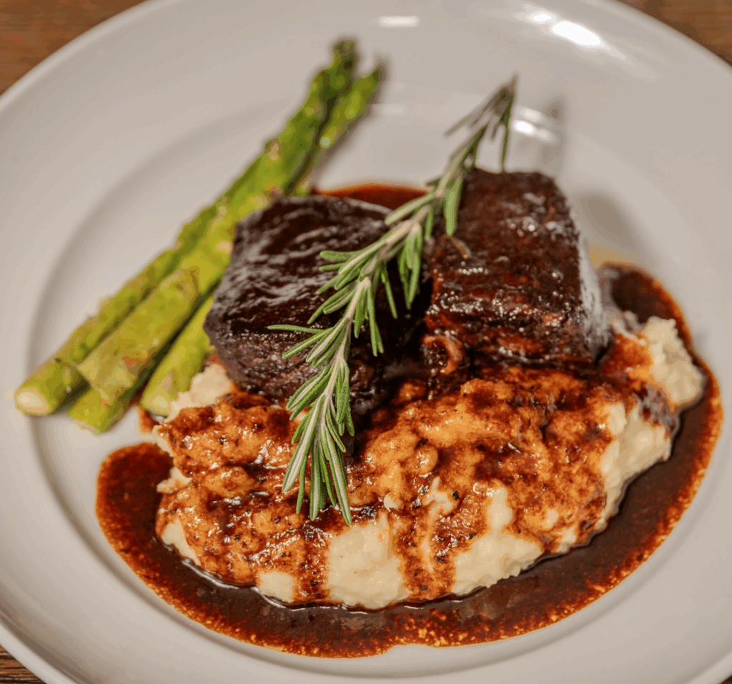 Steak, mashed potatoes, and asparagus from Harbor Steak House in Keego Harbor
