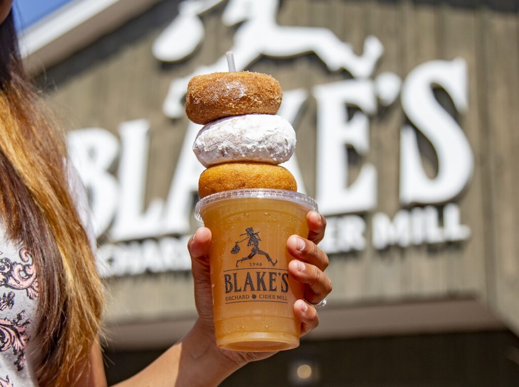 Blake's donuts stacked atop cider