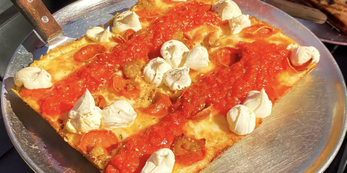 Saucy pizza with puffs of cheese from Tru Pizza Co