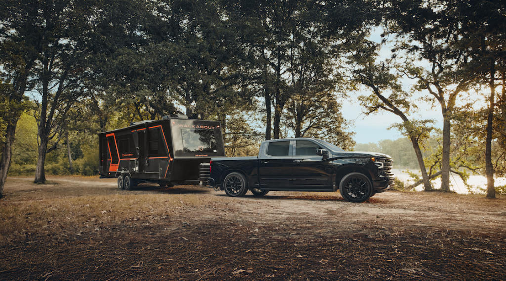 Chevy Silverado 1500 Crew Cab High Country Midnight Black Edition towing an RV