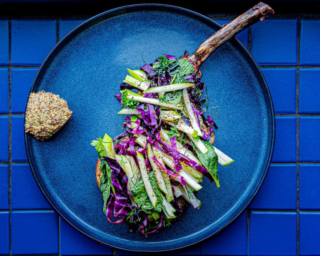 Plated chop from BARDA, photo courtesy of Mark Kurlyandchik / Booth One Creative