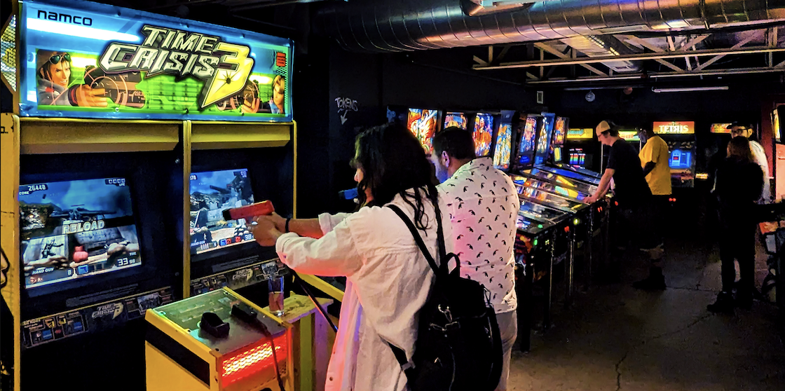 Day Dates - Couple playing a game at Barcade Detroit