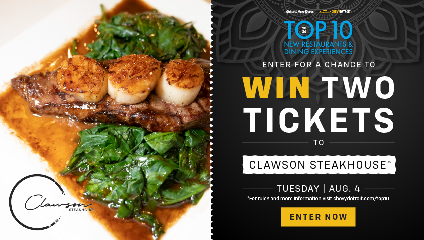 Detroit Free Press and Chevy Detroit 'Top 10 New Restaurants & Dining Experiences' contest banner. Text reads 'Enter for a chance to win two tickets to Clawson Steakhouse, Tuesday, Aug. 4' with an 'Enter Now' button. Left side shows a grilled steak topped with three seared scallops and sautéed spinach.